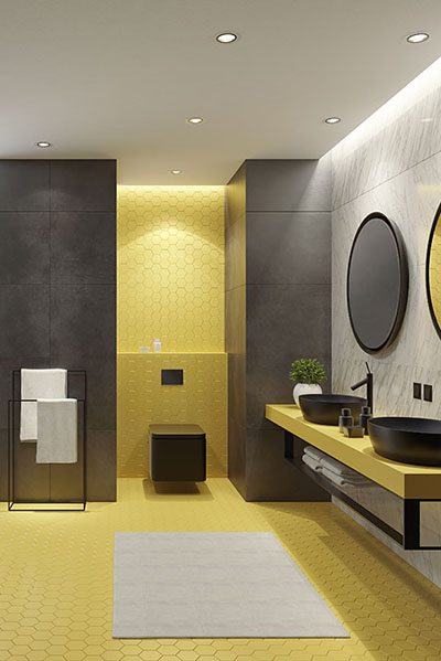 Luxurious bathroom with yellow honeycomb ceramic tiles and gray
and marble large ceramic tiles 

long vanity unit with yellow Corian stone finish, metal black and glass shelf 
and two round black ceramic washbasins, stainless steel vanity sink faucets 
and a decorating plant. Two round wall mirrors with black frame above 
vanity unit. walk-in shower with light large ceramic tiles, stainless steel 
black faucets, decorating yellow wall shelf. 
Walk-in shower with marble long narrow ceramic tiles,glass wall and luxury
ceiling mounted shower head.
Separated black rectangular toilet mounted to a wall with honeycomb wall 
ceramic tiles. metal black standing towel rack.
Ceiling with strip cove lighting and embedded spotlights.

**background is my istock image
